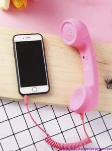 One Android phone and a landline phone are displayed in the photograph.